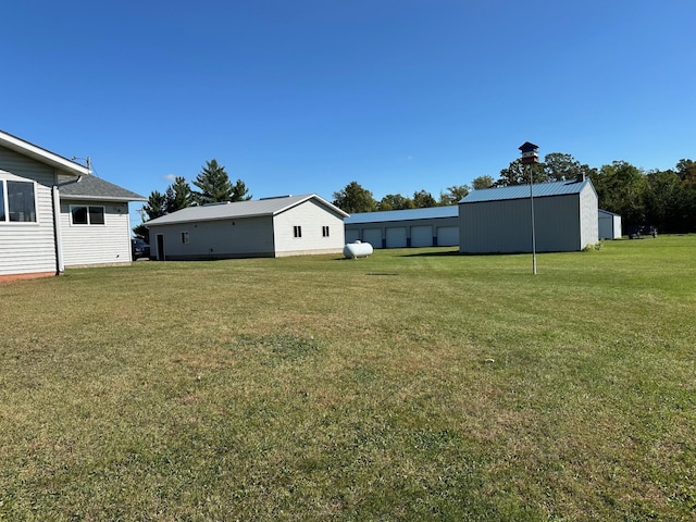 16335 County Road 2, Brainerd, MN 56401 - view of green lawn with an outbuilding
