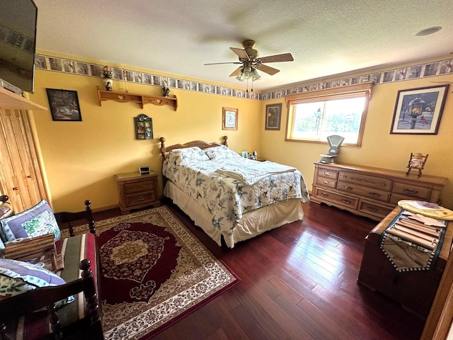 16335 County Road 2, Brainerd, MN 56401 - bedroom featuring dark wood-type flooring, a ceiling fan, a textured ceiling, and baseboards