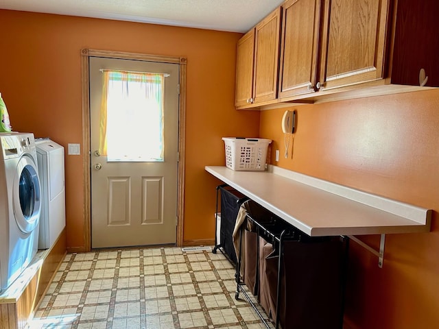 16335 County Road 2, Brainerd, MN 56401 - washroom with cabinet space, independent washer and dryer, light flooring, and baseboards