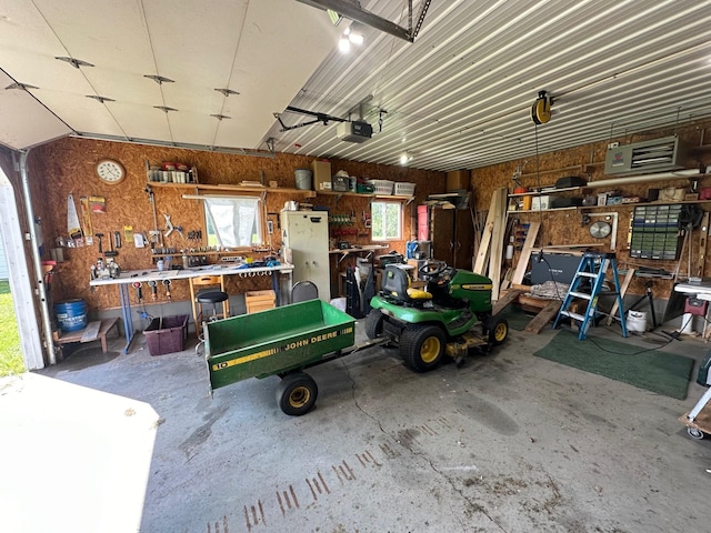 16335 County Road 2, Brainerd, MN 56401 - garage with a workshop area and a garage door opener