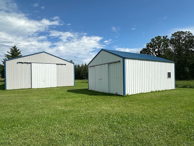 16335 County Road 2, Brainerd, MN 56401 - view of pole building with a lawn