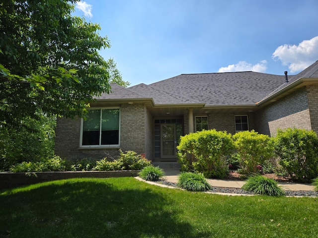 6380 Highland Hills Blvd S, Cottage Grove, MN 55016 - view of front of property with brick siding and a front lawn