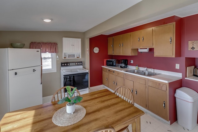5591 Wildwood Ave, Isle, MN 56342 - kitchen featuring white appliances, a sink, and light countertops