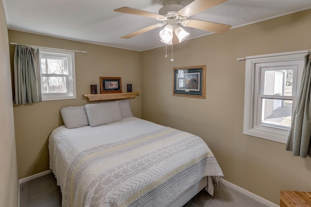 5591 Wildwood Ave, Isle, MN 56342 - bedroom with carpet floors, baseboards, and a ceiling fan
