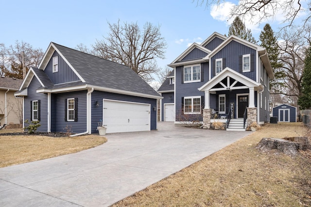 5234 Grand Ave, White Bear Twp, MN 55110 - craftsman inspired home with an attached garage, board and batten siding, driveway, covered porch, and cooling unit