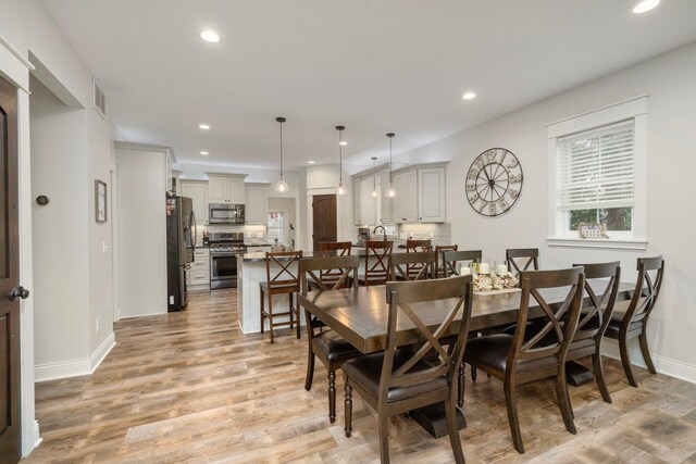 5234 Grand Ave, White Bear Twp, MN 55110 - dining space with baseboards, light wood-type flooring, visible vents, and recessed lighting