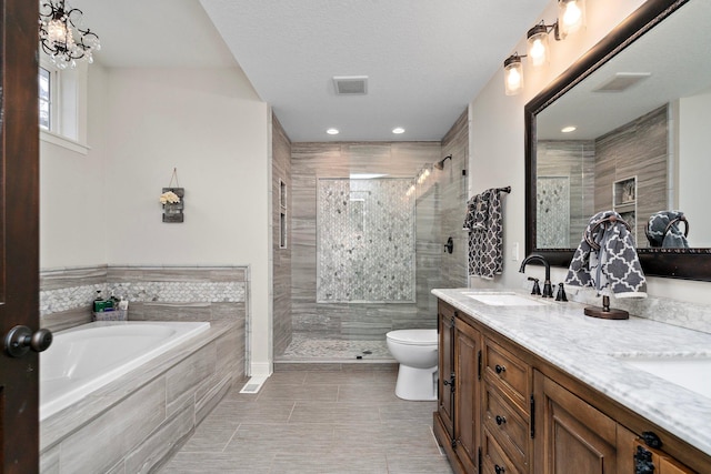 5234 Grand Ave, White Bear Twp, MN 55110 - full bath with toilet, a sink, double vanity, and visible vents