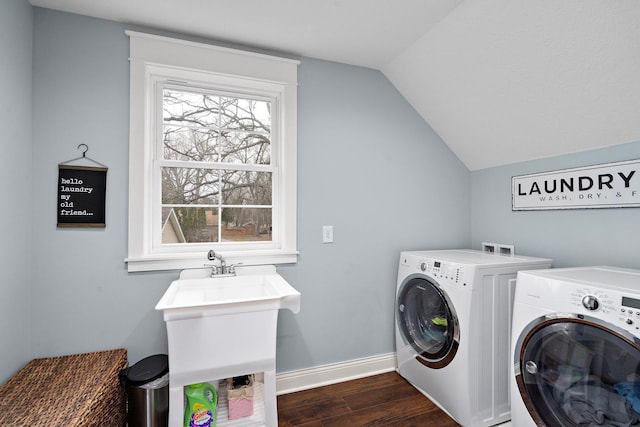 5234 Grand Ave, White Bear Twp, MN 55110 - clothes washing area featuring separate washer and dryer, dark wood-type flooring, baseboards, and laundry area