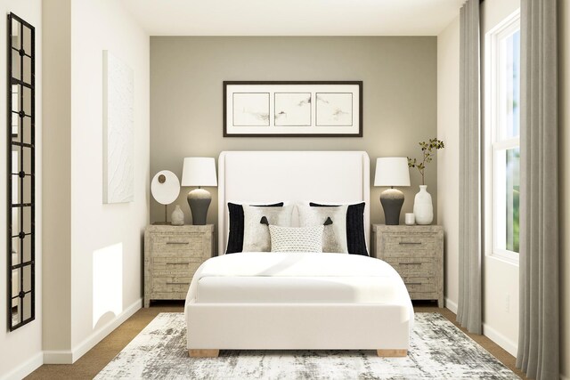 bedroom featuring baseboards and carpet