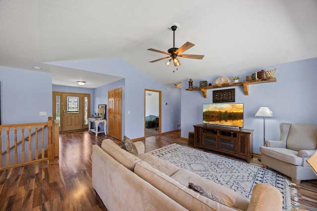 living area with lofted ceiling, a ceiling fan, and wood finished floors