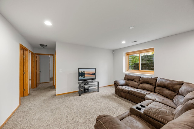 living room with carpet, baseboards, and recessed lighting