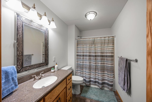full bathroom with vanity, toilet, and a shower with curtain