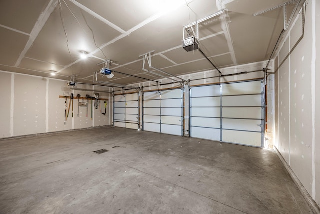 garage featuring a garage door opener