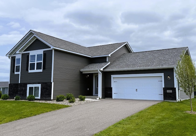 521 Douglas Dr S, Annandale, MN 55302 - view of front of house with driveway, a garage, a front lawn, and a shingled roof