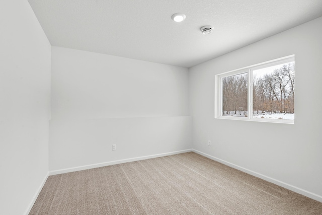 521 Douglas Dr S, Annandale, MN 55302 - carpeted spare room featuring baseboards and a smoke detector