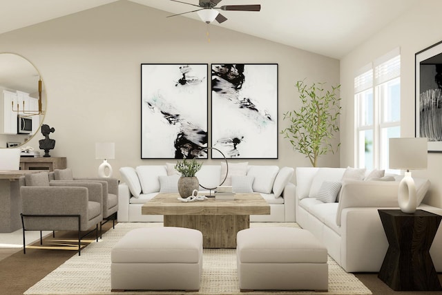 living room featuring vaulted ceiling and a ceiling fan