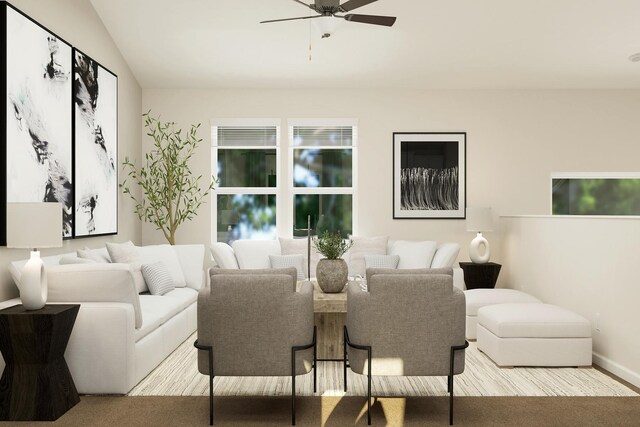 living area with a ceiling fan