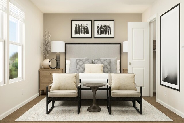 carpeted bedroom with baseboards