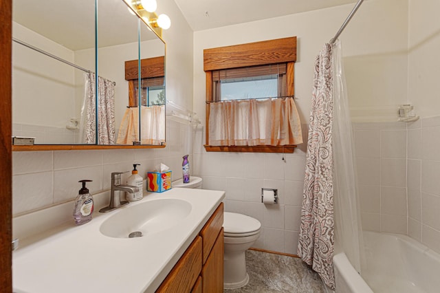 bathroom with toilet, vanity, shower / bath combo with shower curtain, and tile walls