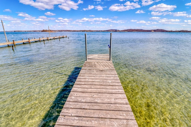 view of dock featuring a water view
