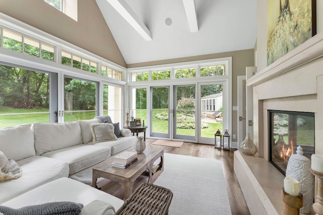 6601 Blackfoot Pass, Edina, MN 55439 - sunroom with a wealth of natural light, high vaulted ceiling, and wood finished floors