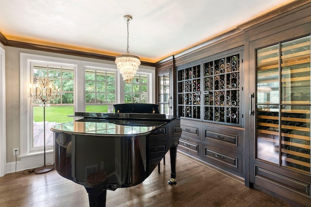 6601 Blackfoot Pass, Edina, MN 55439 - dining room with ornamental molding, a chandelier, and dark wood finished floors