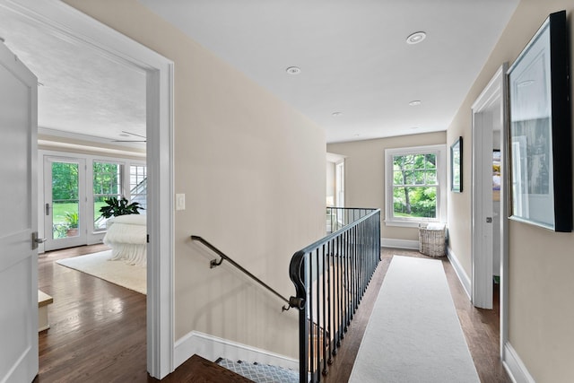 6601 Blackfoot Pass, Edina, MN 55439 - hall with baseboards, an upstairs landing, and wood finished floors
