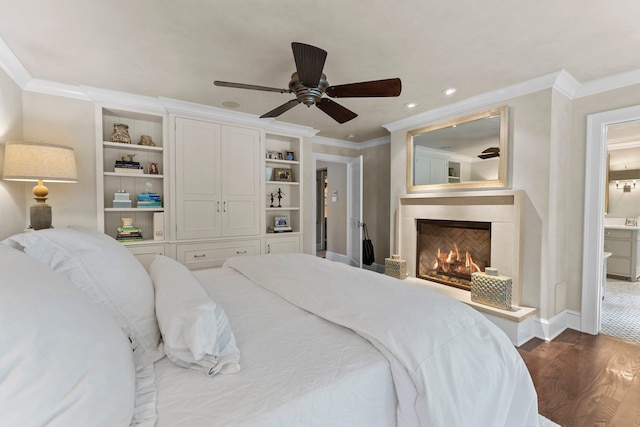 6601 Blackfoot Pass, Edina, MN 55439 - bedroom featuring dark wood-style flooring, ornamental molding, baseboards, a lit fireplace, and a ceiling fan