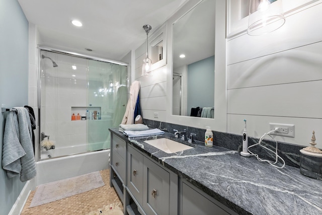 6601 Blackfoot Pass, Edina, MN 55439 - bathroom featuring recessed lighting, bath / shower combo with glass door, and vanity