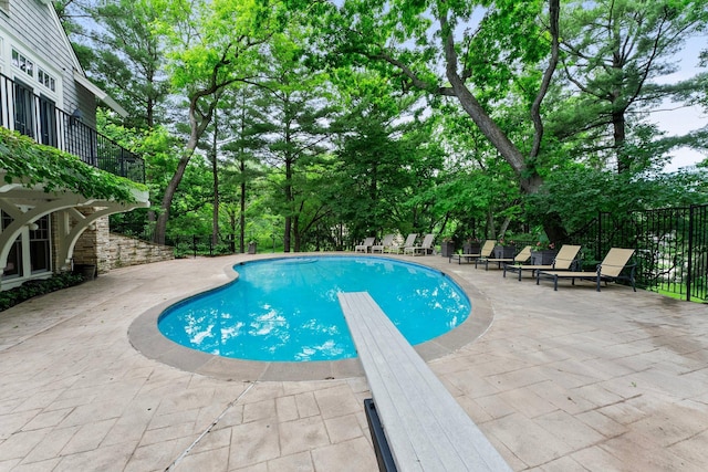 6601 Blackfoot Pass, Edina, MN 55439 - view of pool featuring a patio, fence, a fenced in pool, and a diving board