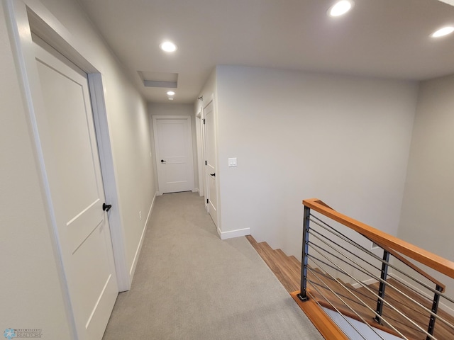 4154 Arthur Dr S, Fargo, ND 58104 - hallway with attic access, light colored carpet, an upstairs landing, and recessed lighting