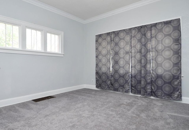 665 Bedford St, Saint Paul, MN 55130 - carpeted spare room featuring crown molding and baseboards