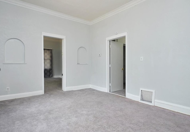 665 Bedford St, Saint Paul, MN 55130 - spare room featuring ornamental molding and carpet floors