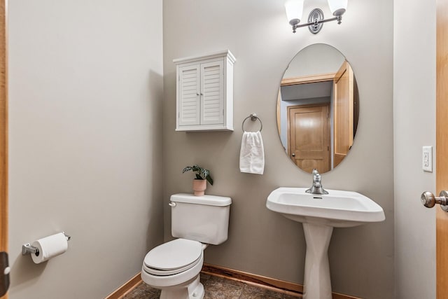 294 Spring St, Saint Paul, MN 55102 - half bath featuring baseboards and toilet