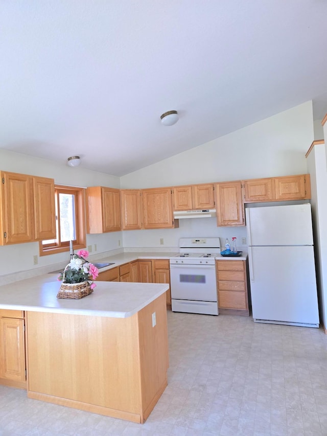 kitchen featuring light brown cabinetry, under cabinet range hood, white appliances, and lofted ceiling