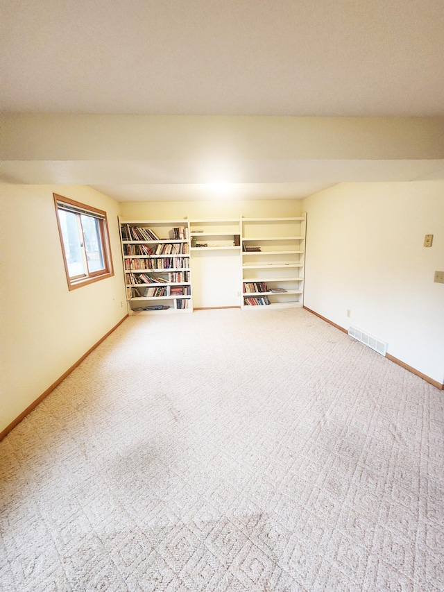 14595 Lynndale Ln, Baxter, MN 56425 - spare room featuring baseboards, visible vents, and carpet floors
