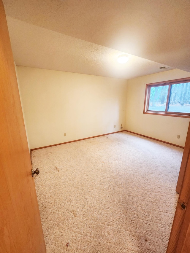 14595 Lynndale Ln, Baxter, MN 56425 - spare room featuring baseboards and carpet flooring