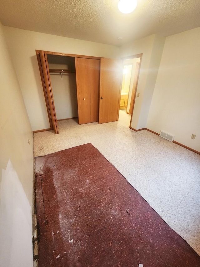 14595 Lynndale Ln, Baxter, MN 56425 - unfurnished bedroom featuring baseboards, visible vents, and carpet floors