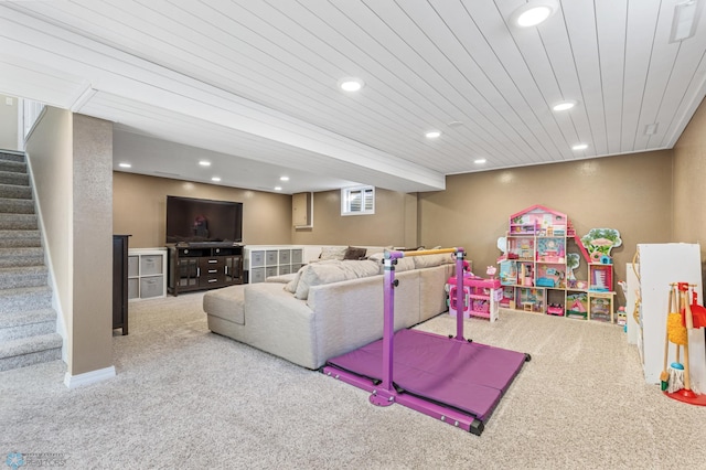 carpeted living area featuring wooden ceiling, stairway, and recessed lighting