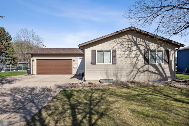1922 18th St S, Fargo, ND 58103 - view of front of house with concrete driveway and an attached garage