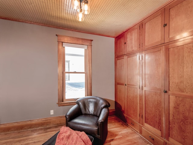 115 Geranium Ave W, Saint Paul, MN 55117 - living area featuring light wood-style floors and crown molding