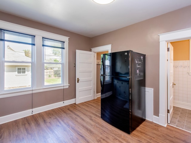 115 Geranium Ave W, Saint Paul, MN 55117 - kitchen featuring freestanding refrigerator and light wood-style floors