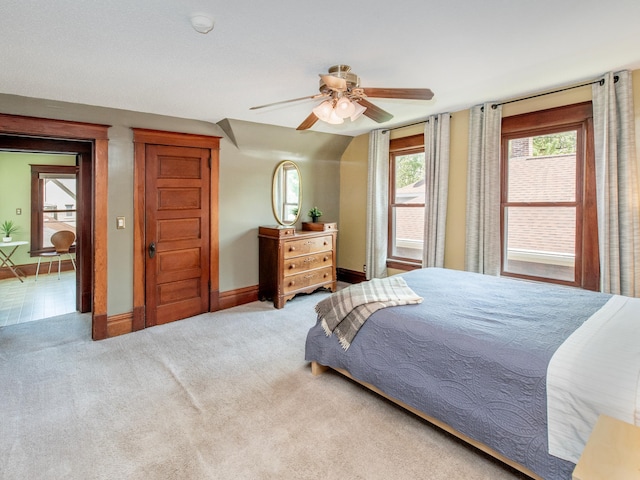 115 Geranium Ave W, Saint Paul, MN 55117 - carpeted bedroom with baseboards and ceiling fan