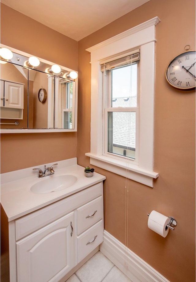 115 Geranium Ave W, Saint Paul, MN 55117 - bathroom featuring vanity and tile patterned floors