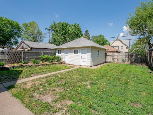 115 Geranium Ave W, Saint Paul, MN 55117 - fenced backyard with an outbuilding