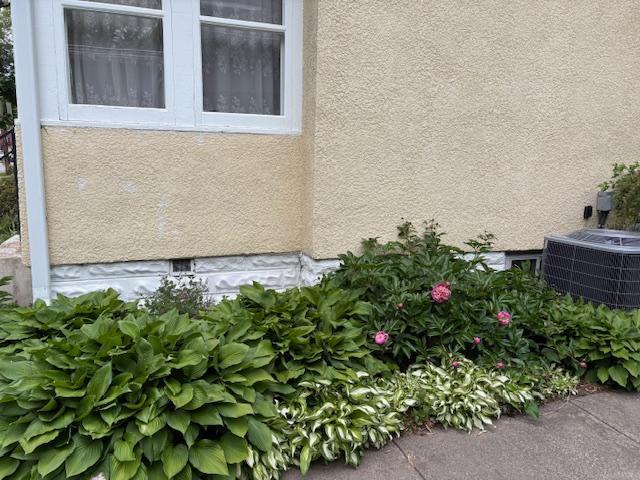 115 Geranium Ave W, Saint Paul, MN 55117 - exterior view of stucco siding