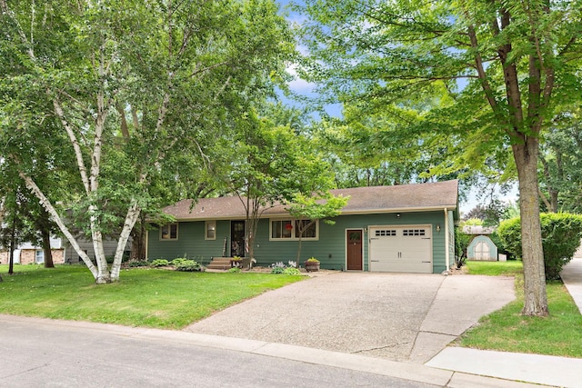 113 Oak Ave SW, Saint Michael, MN 55376 - view of front of house with an attached garage, a storage unit, driveway, a front lawn, and a shingled roof