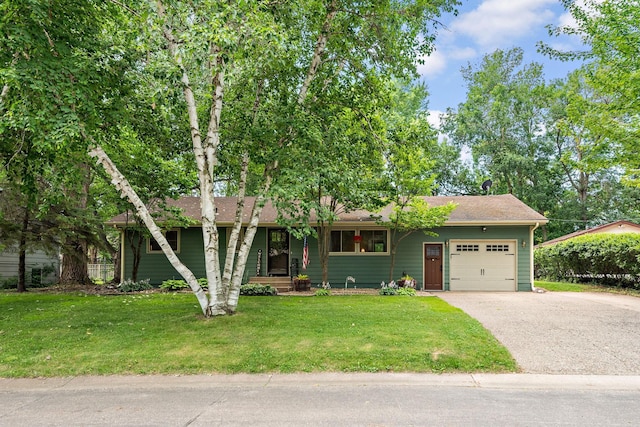 113 Oak Ave SW, Saint Michael, MN 55376 - view of front of home with a garage, driveway, and a front yard