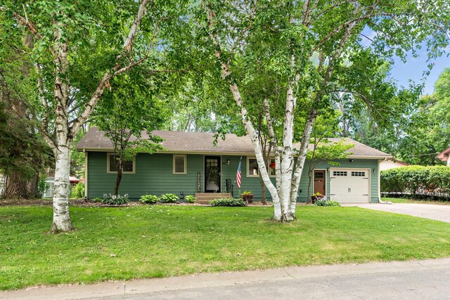 113 Oak Ave SW, Saint Michael, MN 55376 - ranch-style house with an attached garage, driveway, and a front lawn