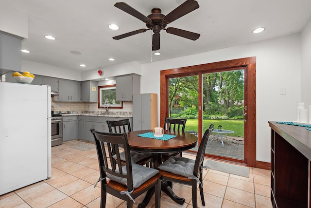 113 Oak Ave SW, Saint Michael, MN 55376 - dining space featuring a ceiling fan, light tile patterned flooring, and recessed lighting